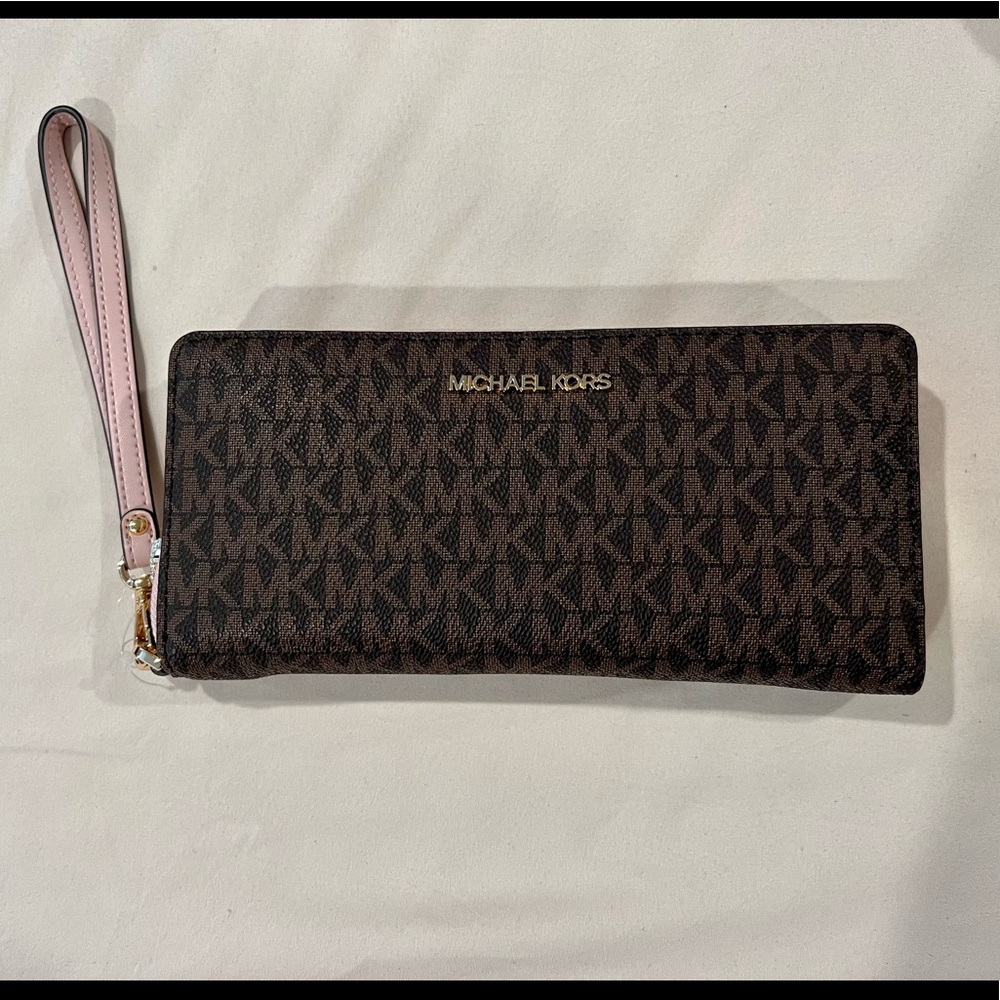 Brown and powder blush Michael Kors zipper wallet